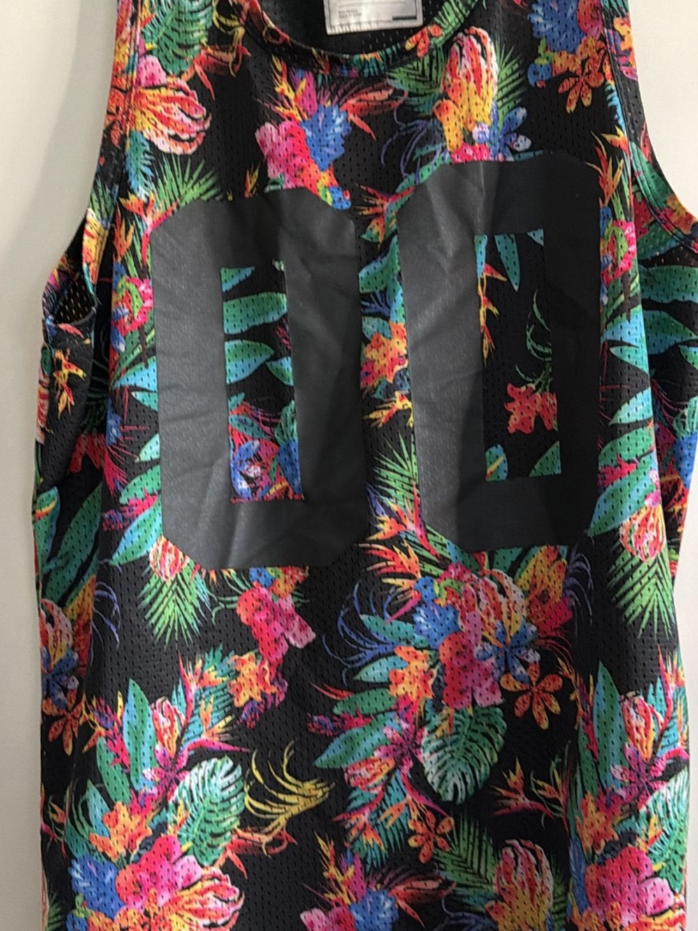 on the byas Black Floral Mesh Tank with Multicolor Tropical Print